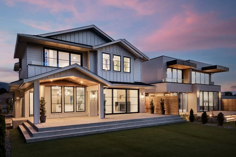 Exterior at dusk of a custom home built by Edward West Luxury Homes