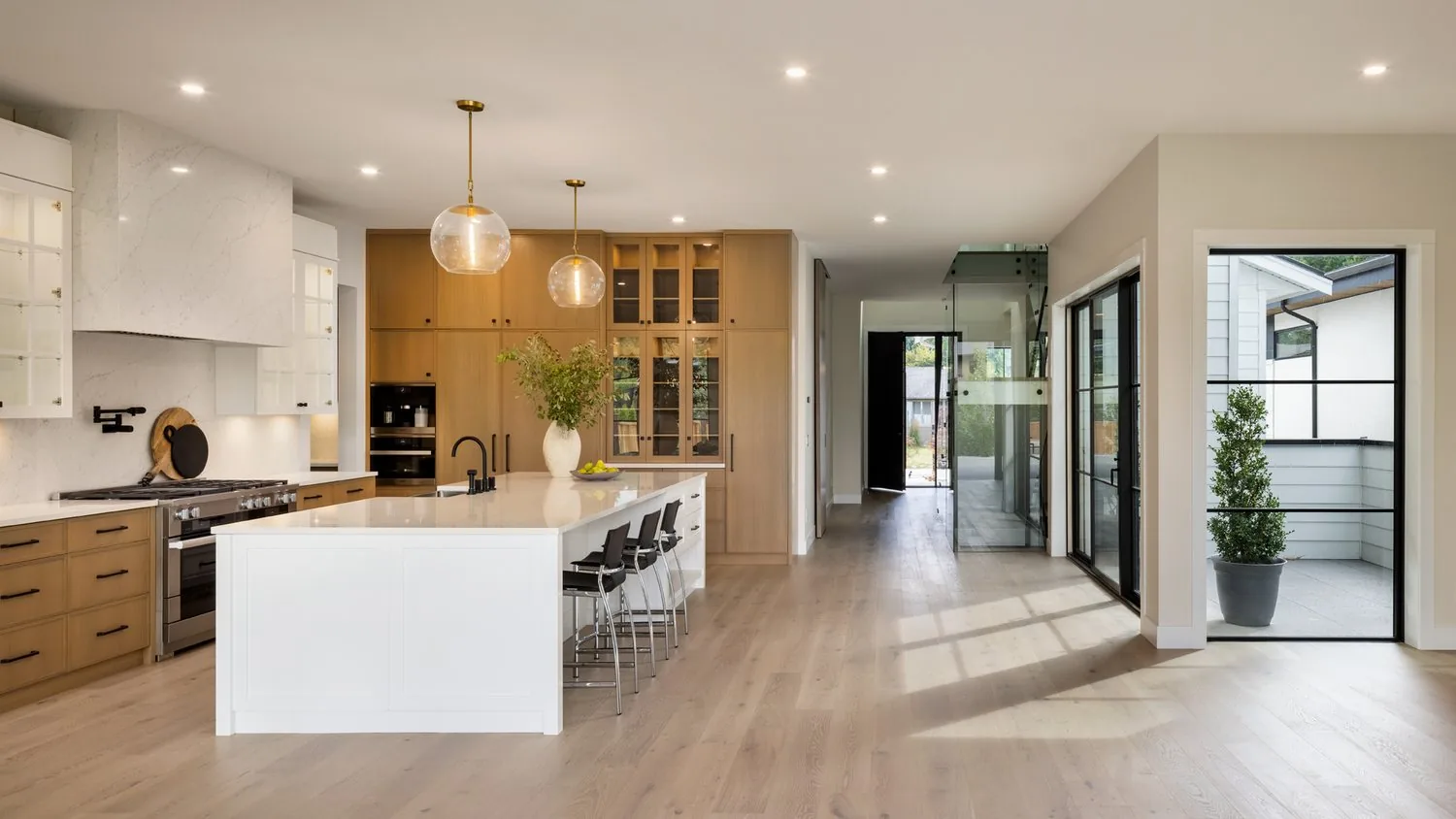 The main living space of a finished Kelowna custom home, empty and quiet